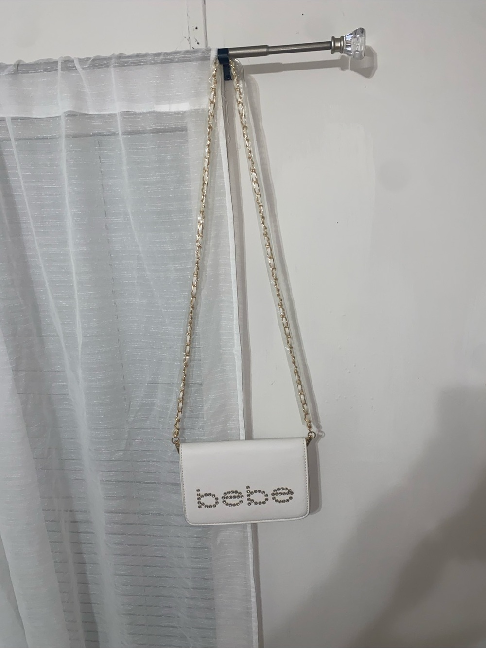 bebe White Crossbody with Gold Chain Accent